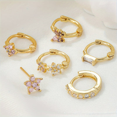 שני | עגילי פרח עדינים בגוון ורוד־זהב