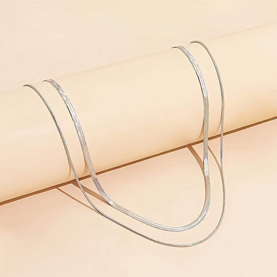 נופר | סט שרשראות נחש זהובות במראה אלגנטי ונשי