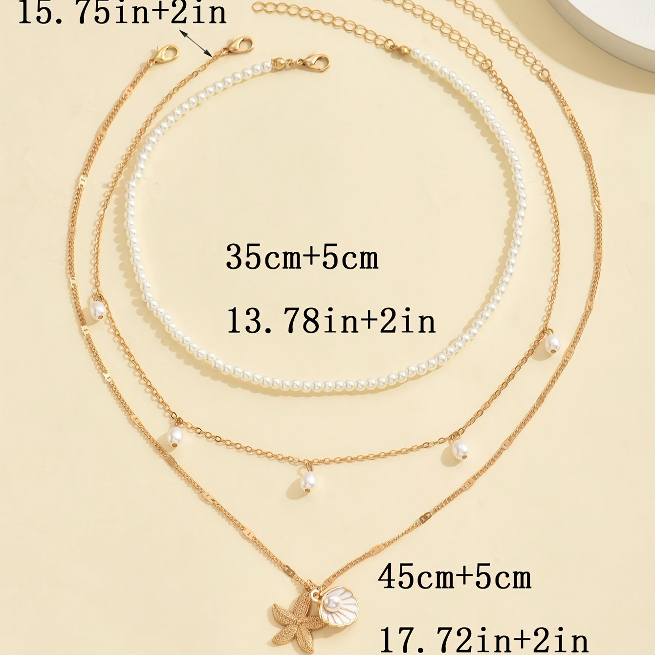 אלינור | שרשרת בסגנון חוף עם תליון צדף וכוכב ים בעיצוב יוקרתי