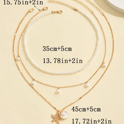 אלינור | שרשרת בסגנון חוף עם תליון צדף וכוכב ים בעיצוב יוקרתי